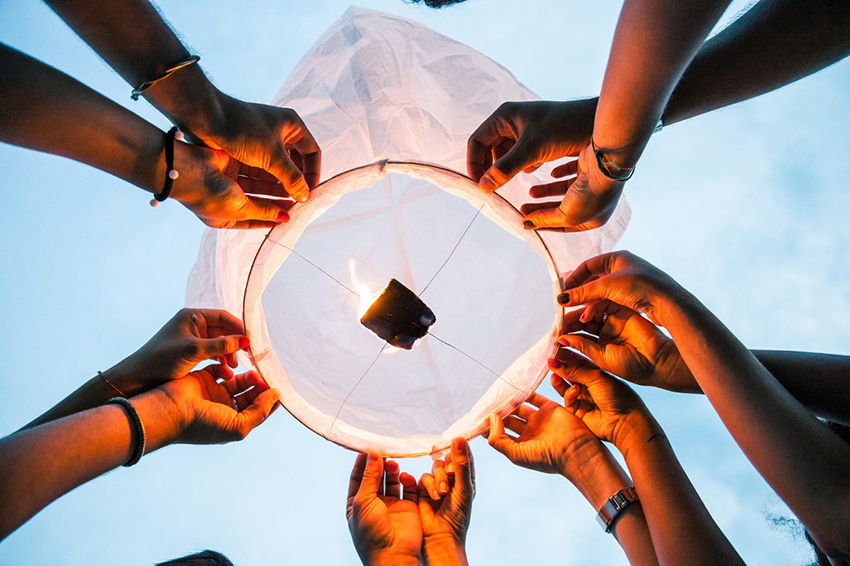 Lighting a chinese lantern at birthday party.jpg